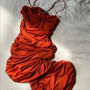 Never worn, long tight dress, tags still on!